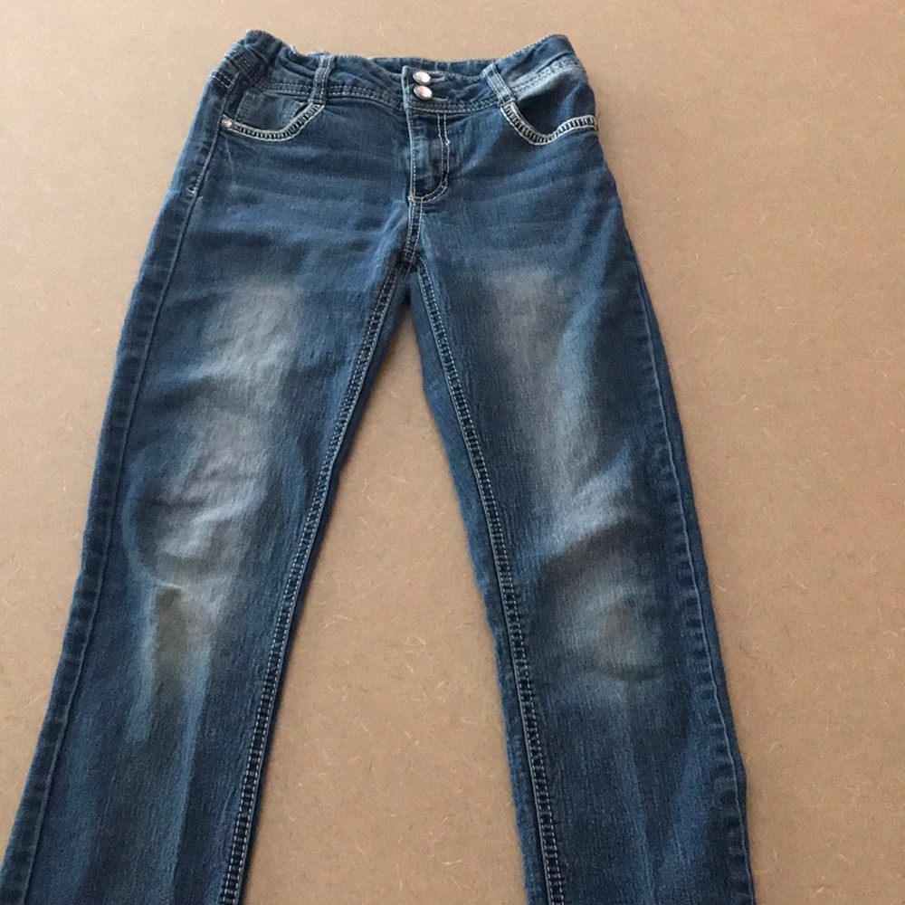Denim jeans with Rhinestones on them for girls.